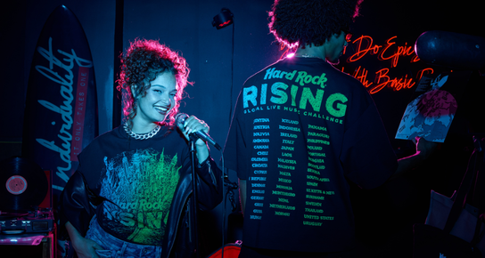 Hard Rock Rising graphic T-shirts in a music performance setting